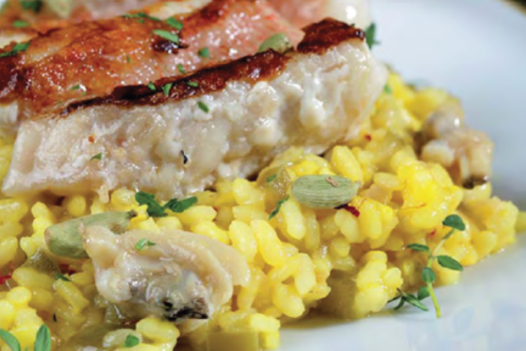 Foto de Cabracho con arroz, almejas y azafrán