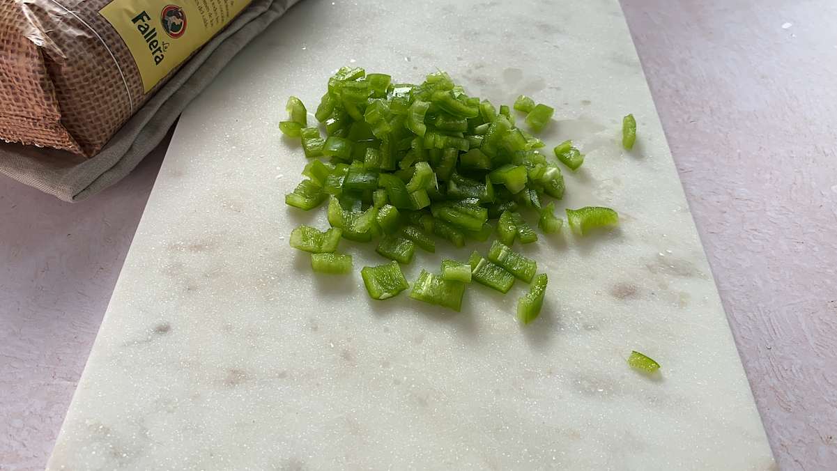paso a paso arroz con conejo y caracoles verduras