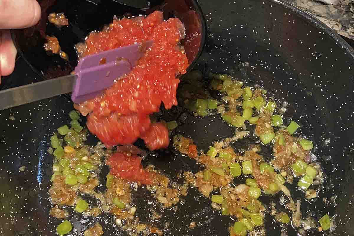 paso a paso arroz con bogavante meloso tomate