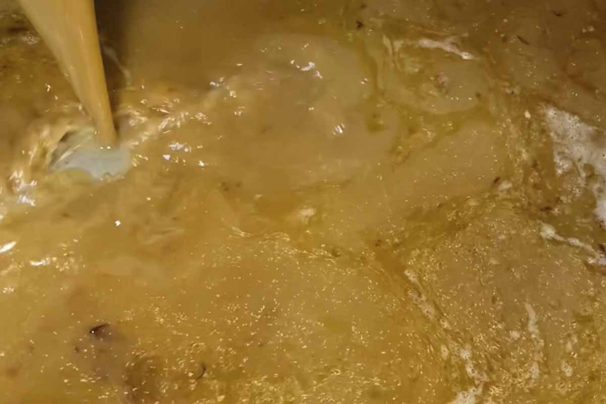paso a paso arroz con almejas y gambas caldo