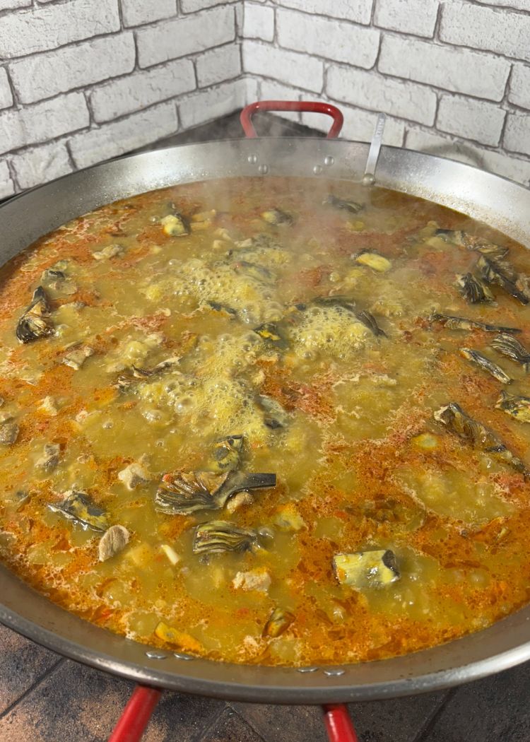 Incorporar arroz a arroz con alcachofas y Secreto