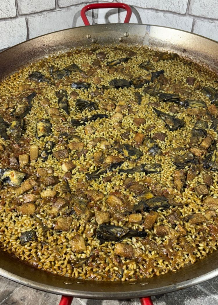 Presentación de arroz con alcachofas y Secreto
