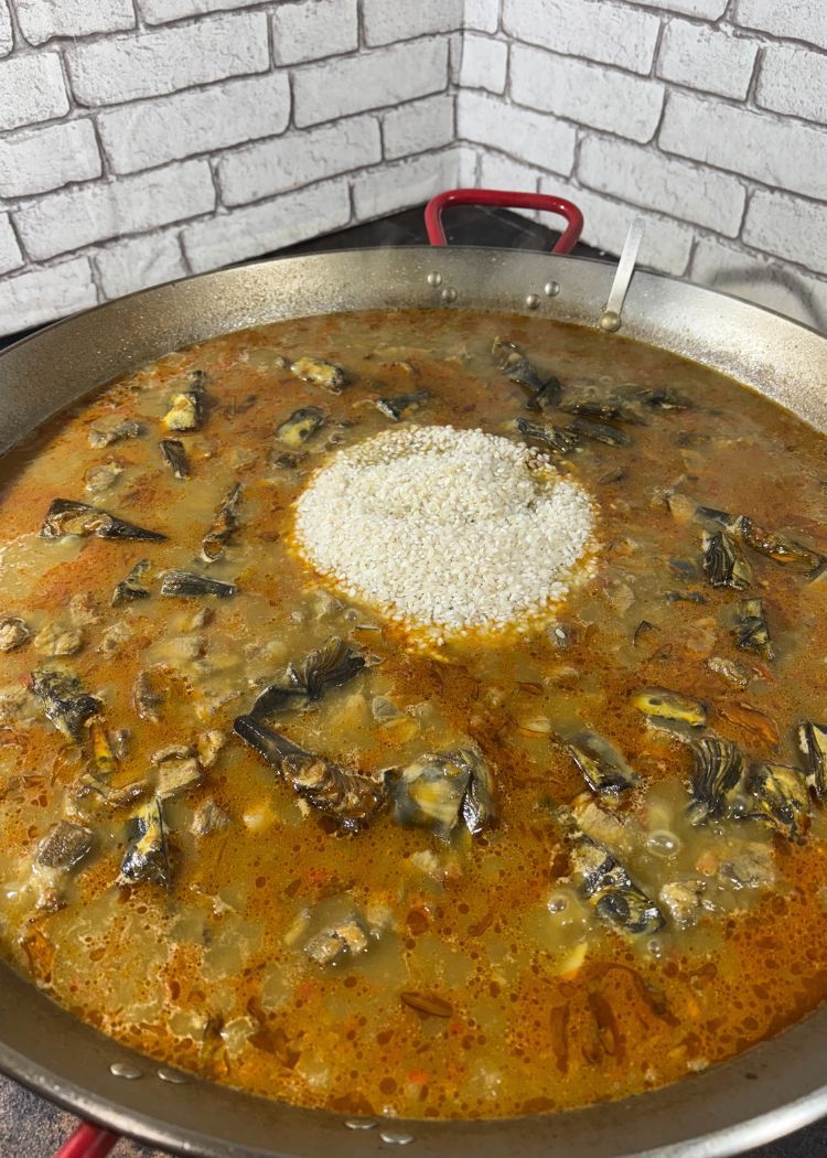 Verter arroz en arroz con alcachofas y Secreto