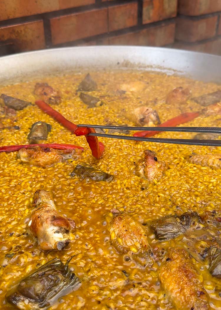 Cocinar arroz con alitas de pollo