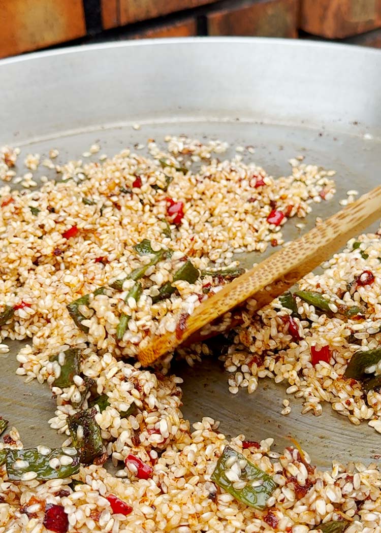 Incorporar arroz a arroz con muslitos de pollo