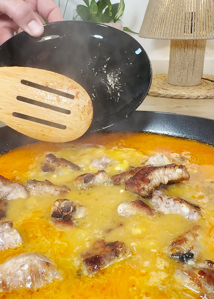Devolver costillas a arroz murciano