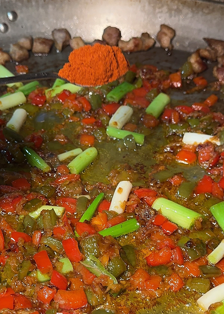 incorporar ajos para arroz de magro y verduras